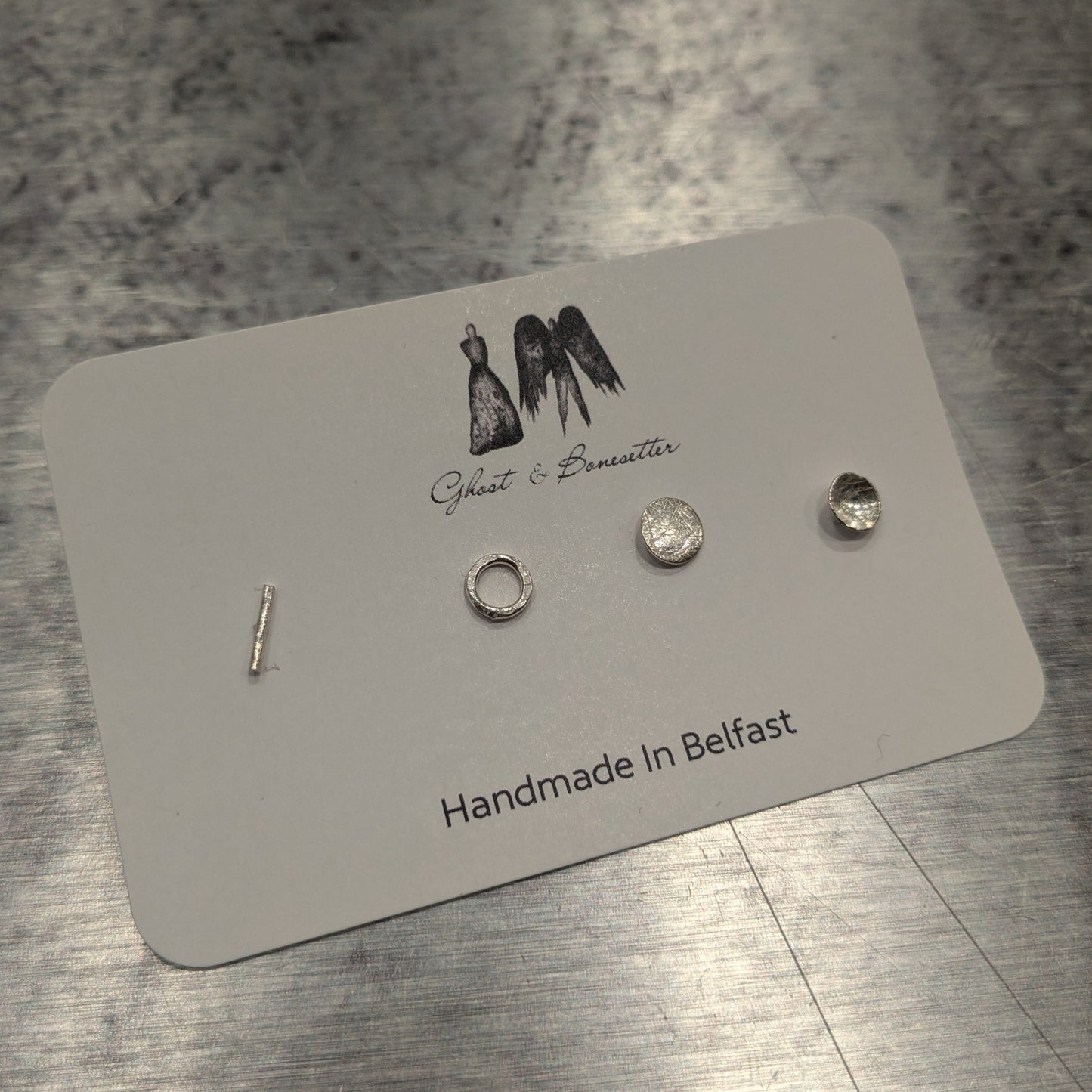 Four Random Silver Etched Stud Earrings