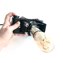 Load image into Gallery viewer, VINTAGE BELLOWS CAMERA RETRO TABLE LAMP - Re-imagined Vintage Objects by RETRO Lighting
