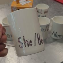 Load and play video in Gallery viewer, She / Her / Hers - WRAPPED UP PRONOUN MUG
