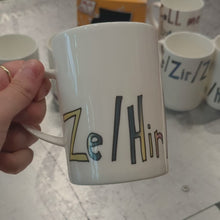 Load and play video in Gallery viewer, Ze / Hir / Hirs - WRAPPED UP PRONOUN MUG
